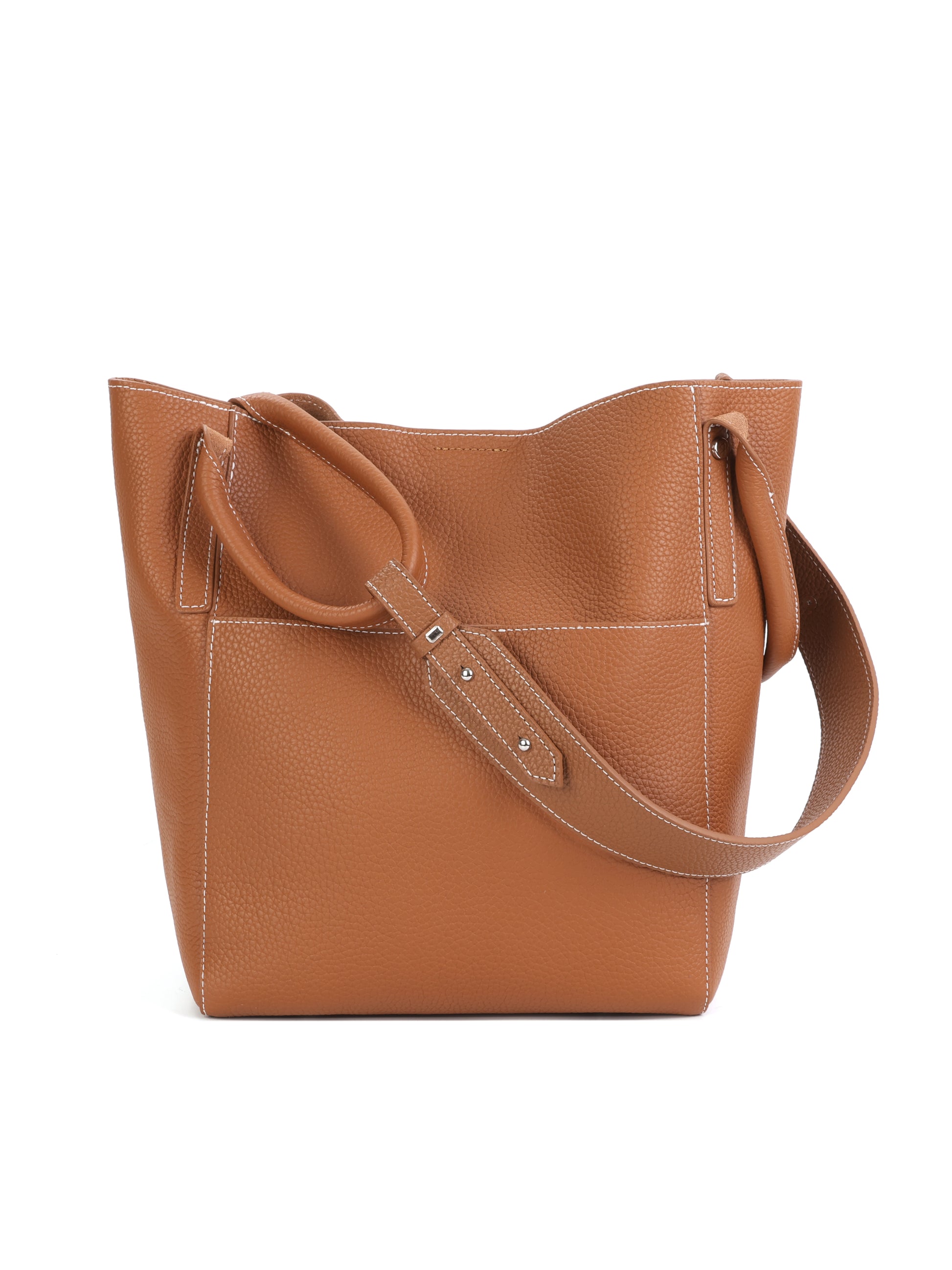 Brown leather tote handbag with textured finish and adjustable strap, white stitching detail
