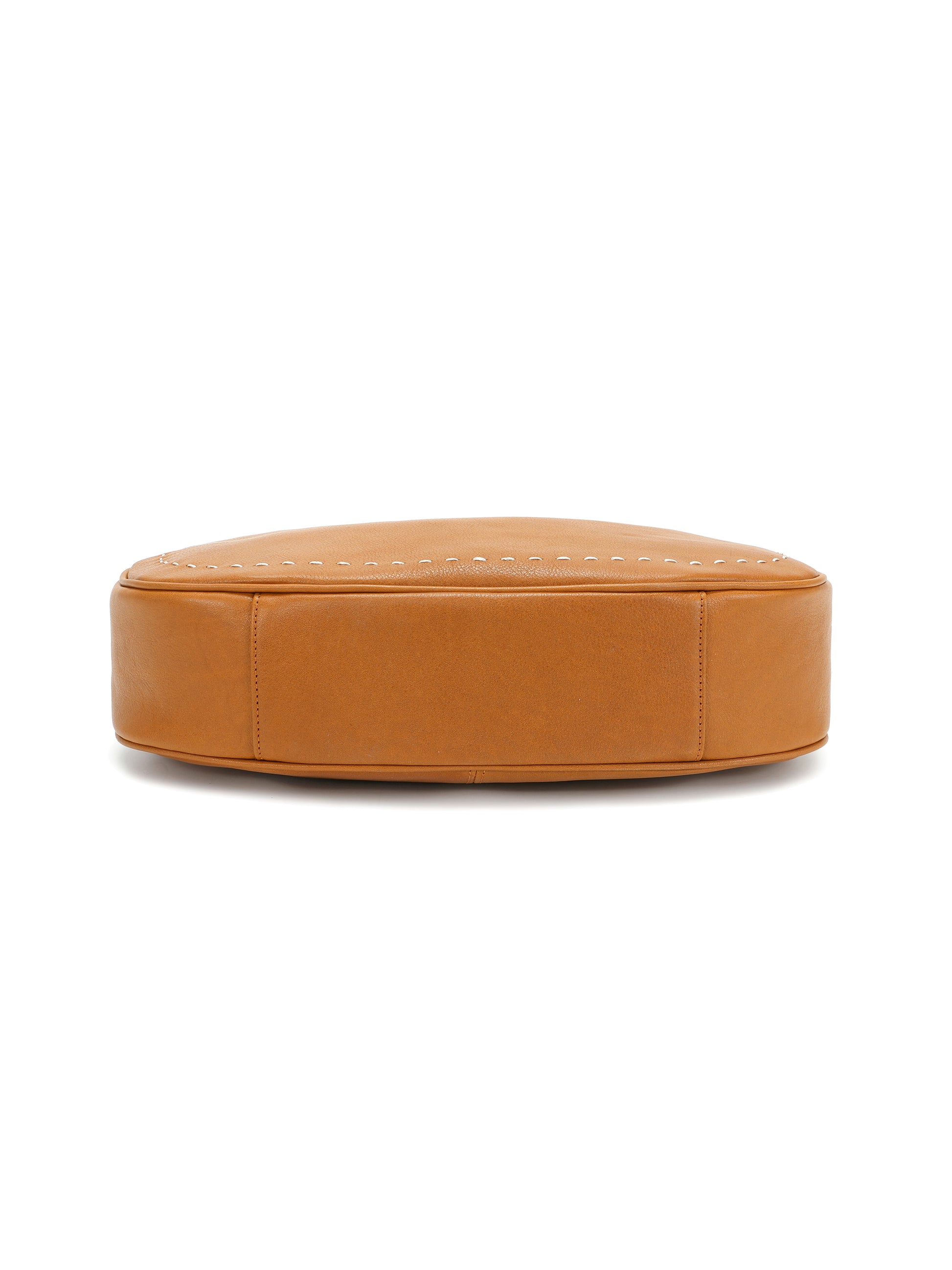 Bottom view of a tan leather handbag with smooth finish and detailed stitching