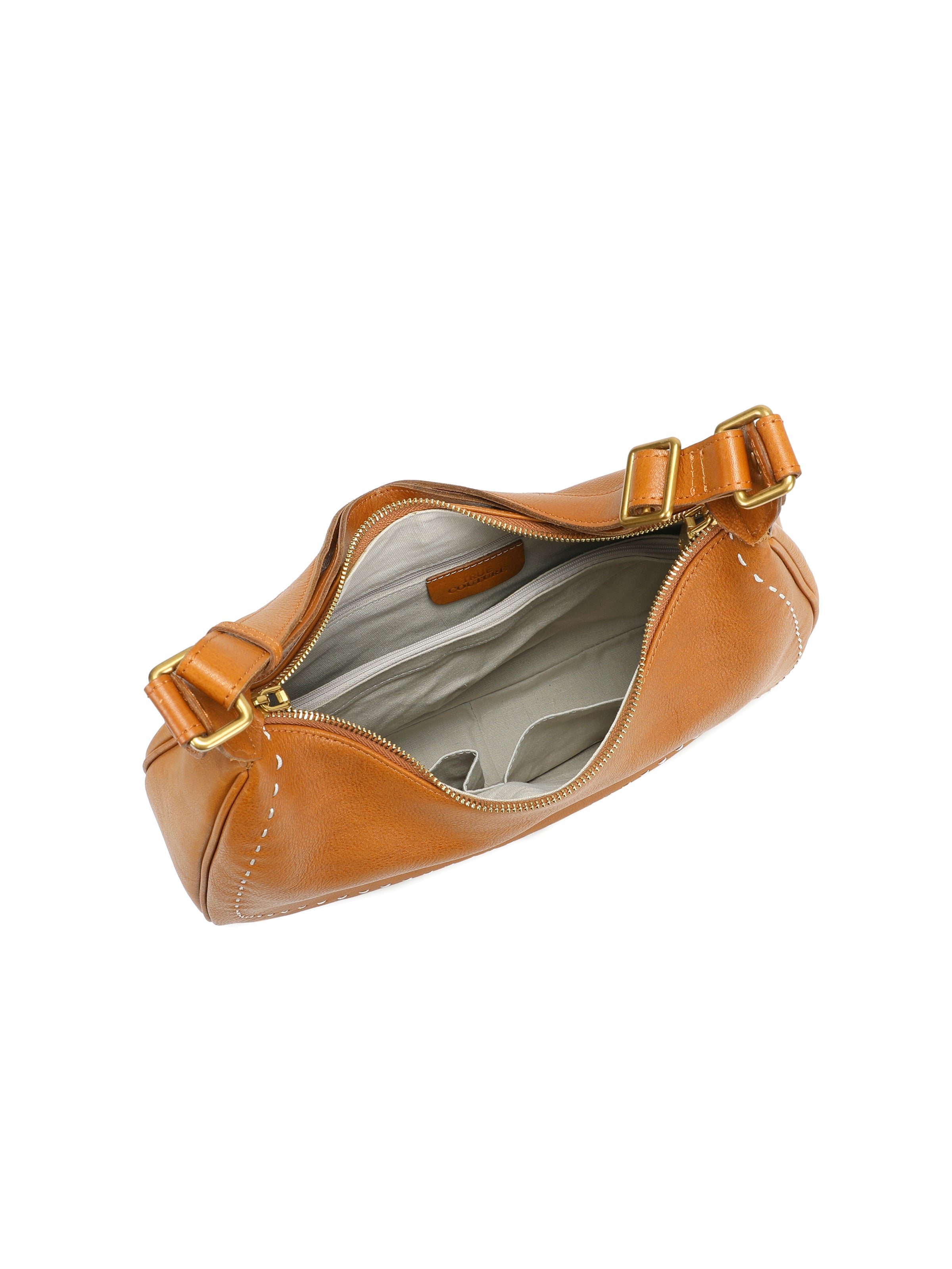 Tan leather handbag with gold zipper, top view showing spacious interior and compartments