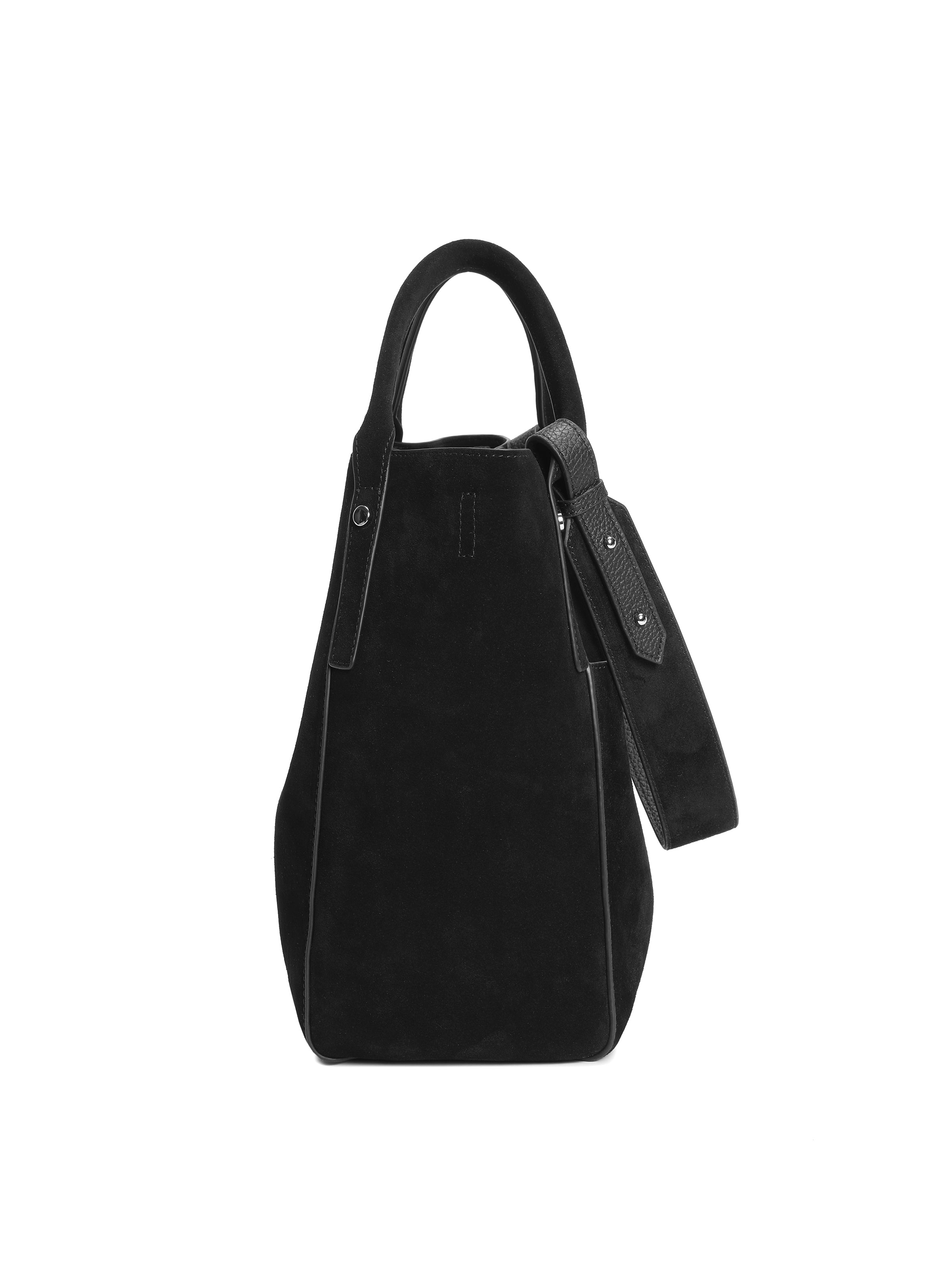 Black suede tote handbag with top handles and side strap, modern minimalist design