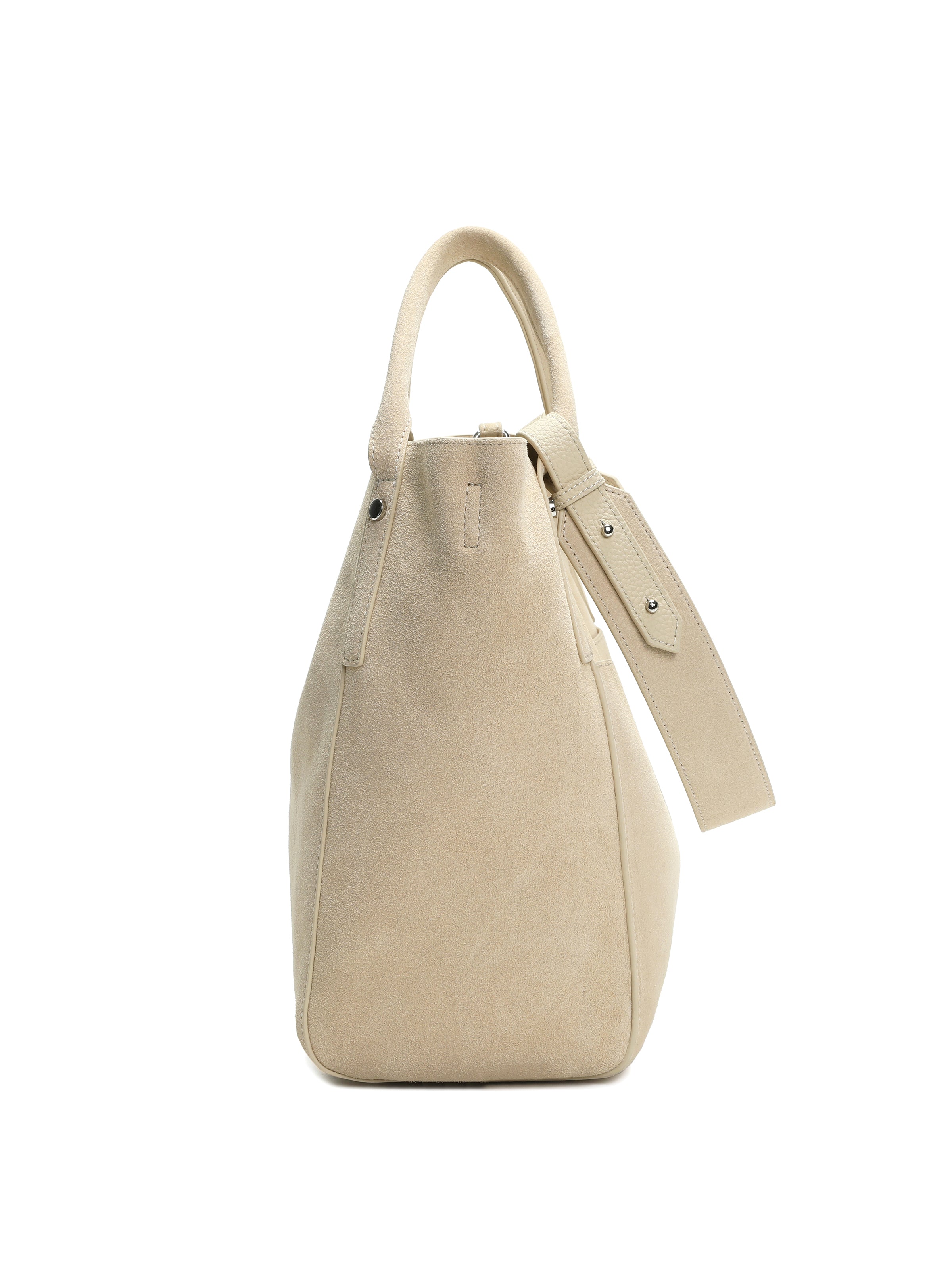 Beige suede bucket handbag with top handle and adjustable strap, side view on white background