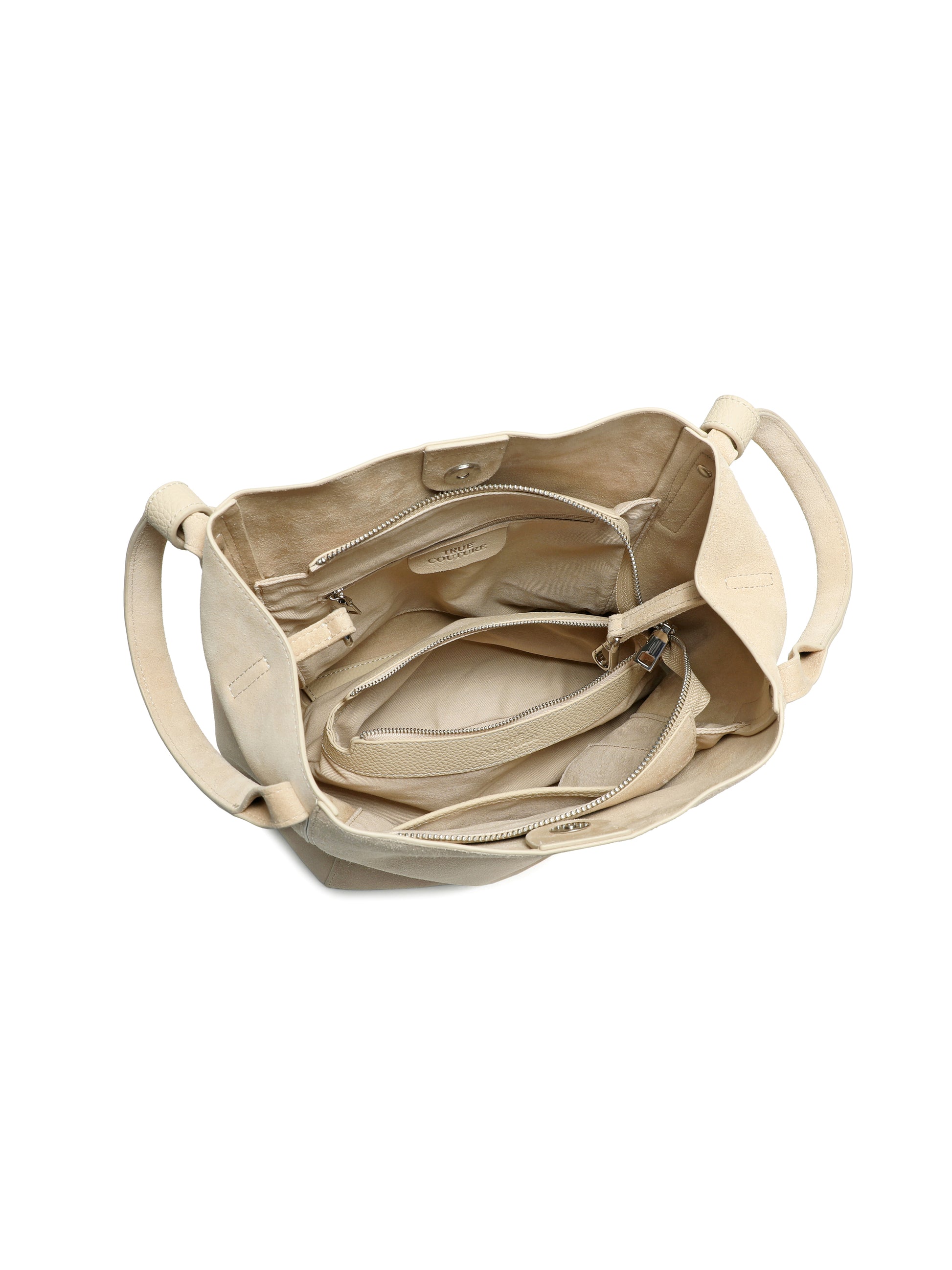 Beige suede tote handbag with top handles, spacious interior, zipper pockets, and snap closure