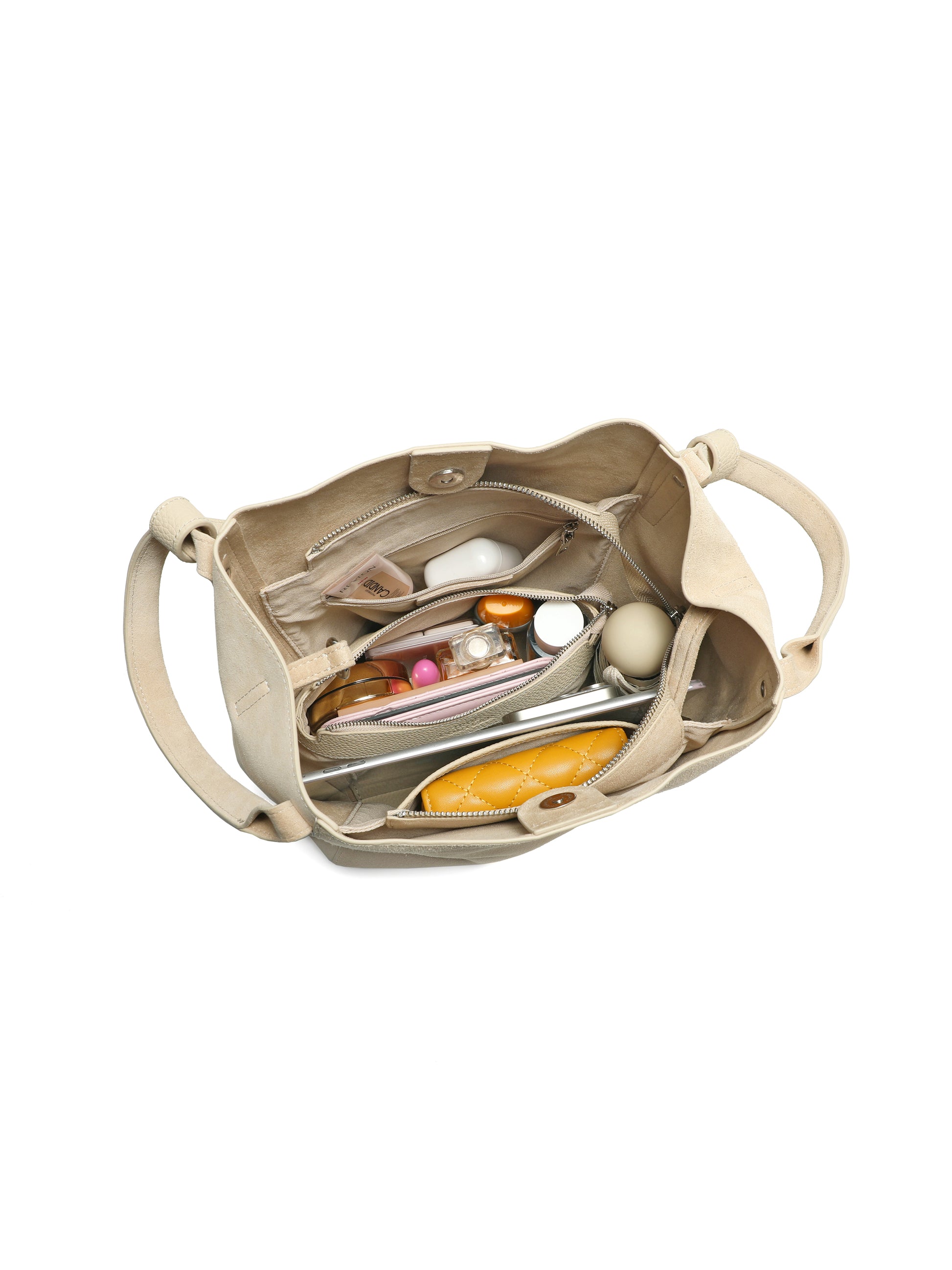 Beige leather handbag with organized compartments, top view, showcasing roomy interior design