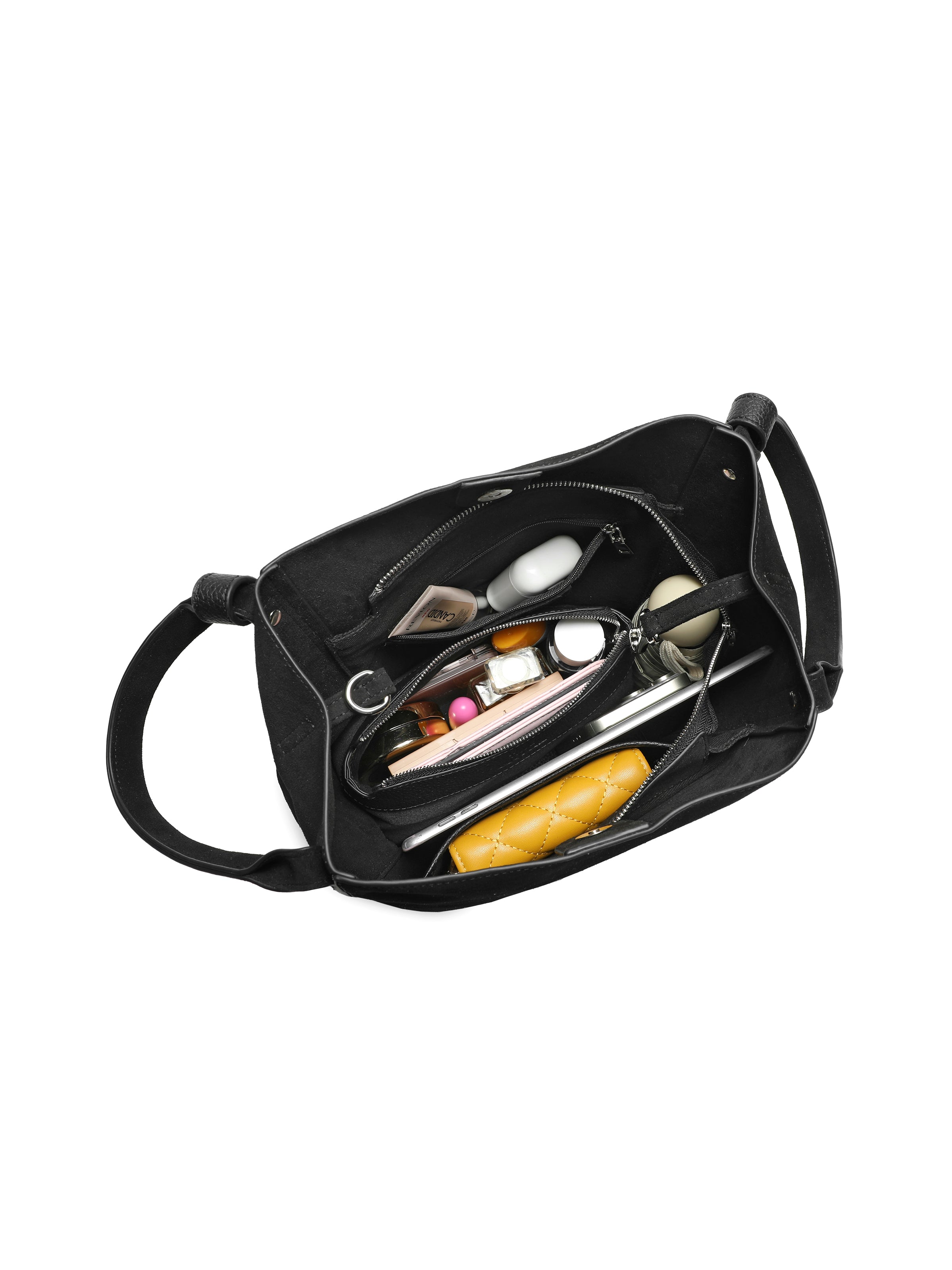 Black tote handbag with organized compartments and mixed leather accessories inside