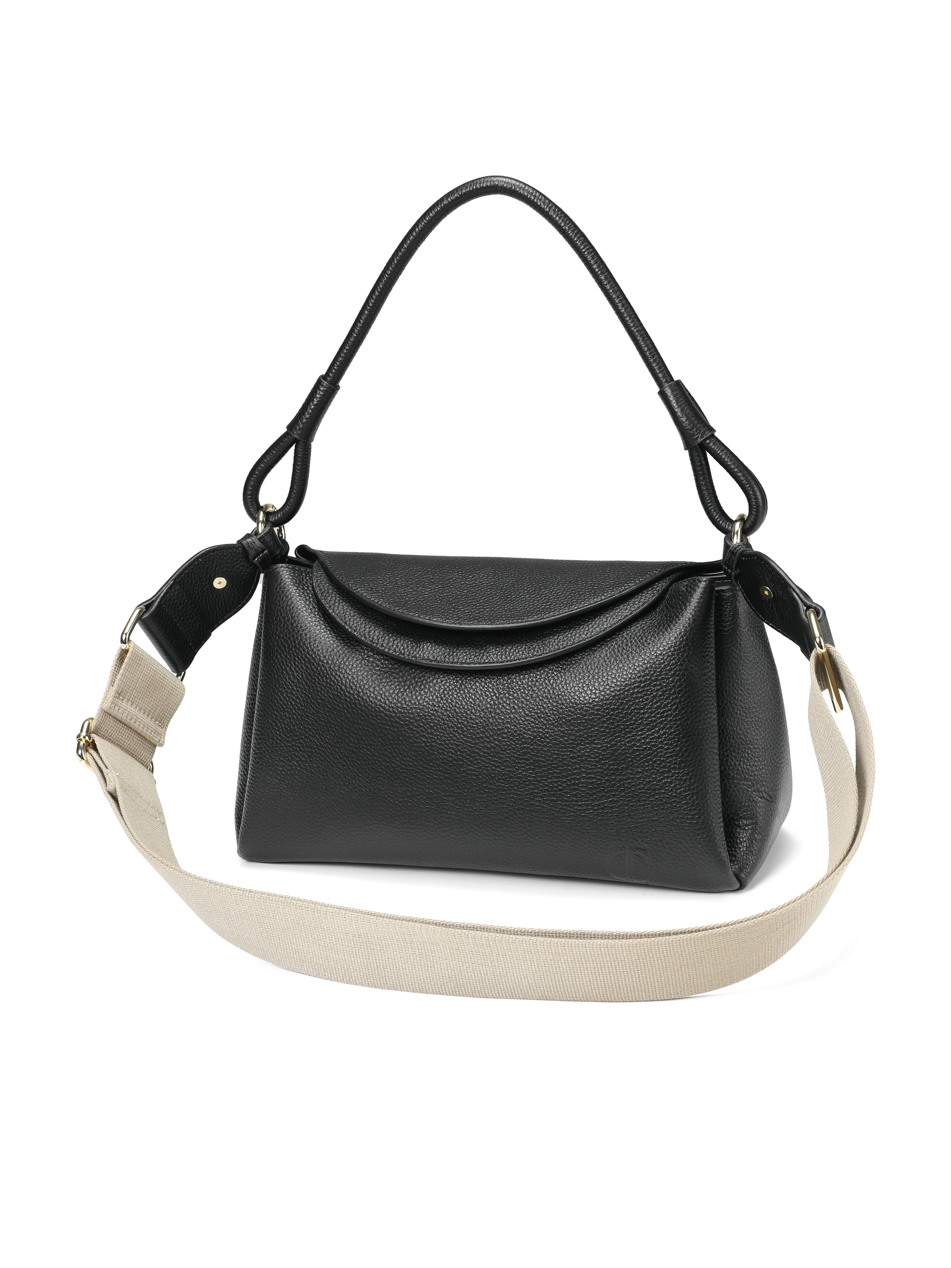 Black leather handbag with top handle and beige shoulder strap on white background