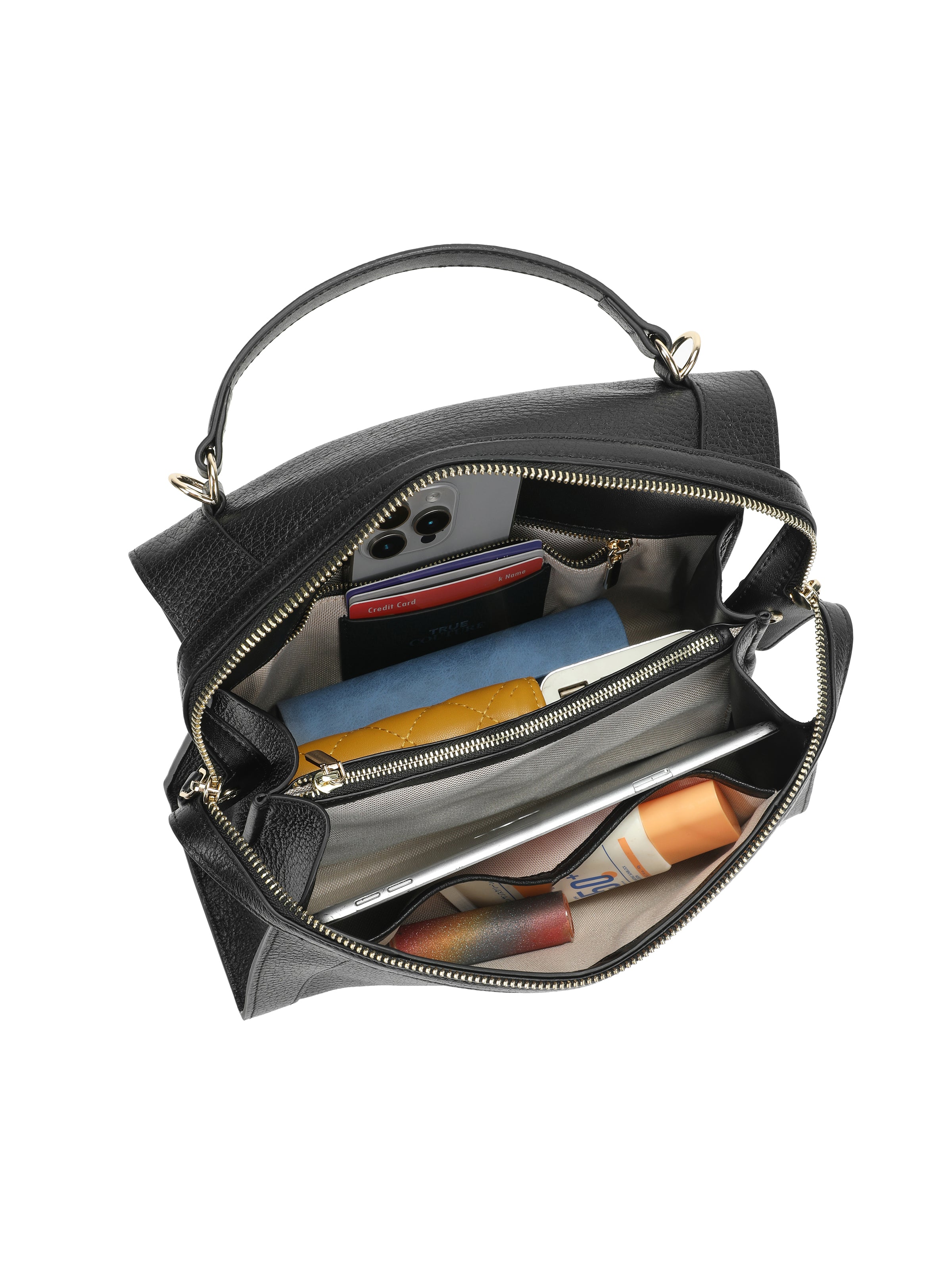 Top view of black leather handbag with gold zipper, multiple compartments and organized contents