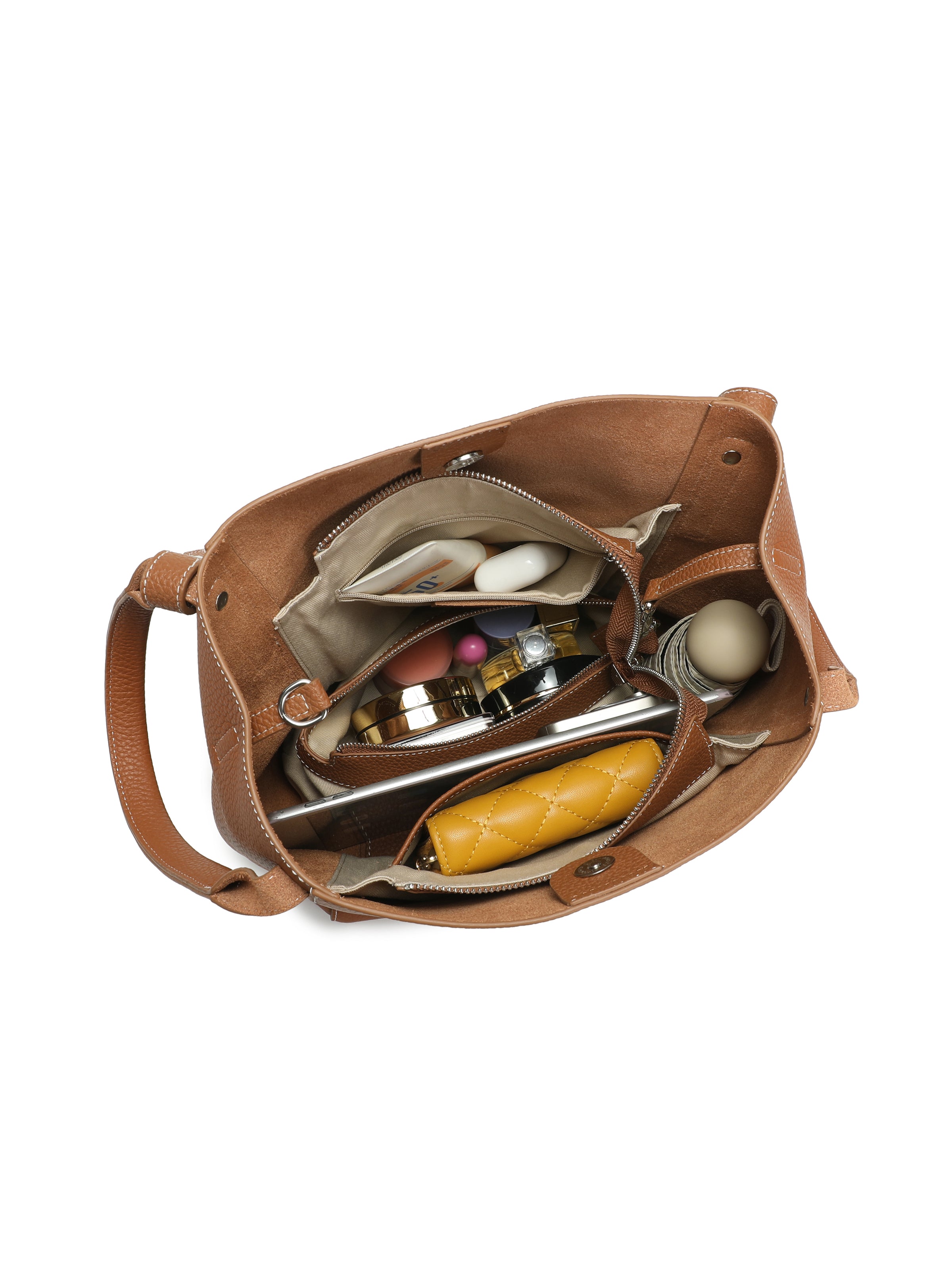 Brown leather tote handbag with organized compartments holding cosmetics and essentials