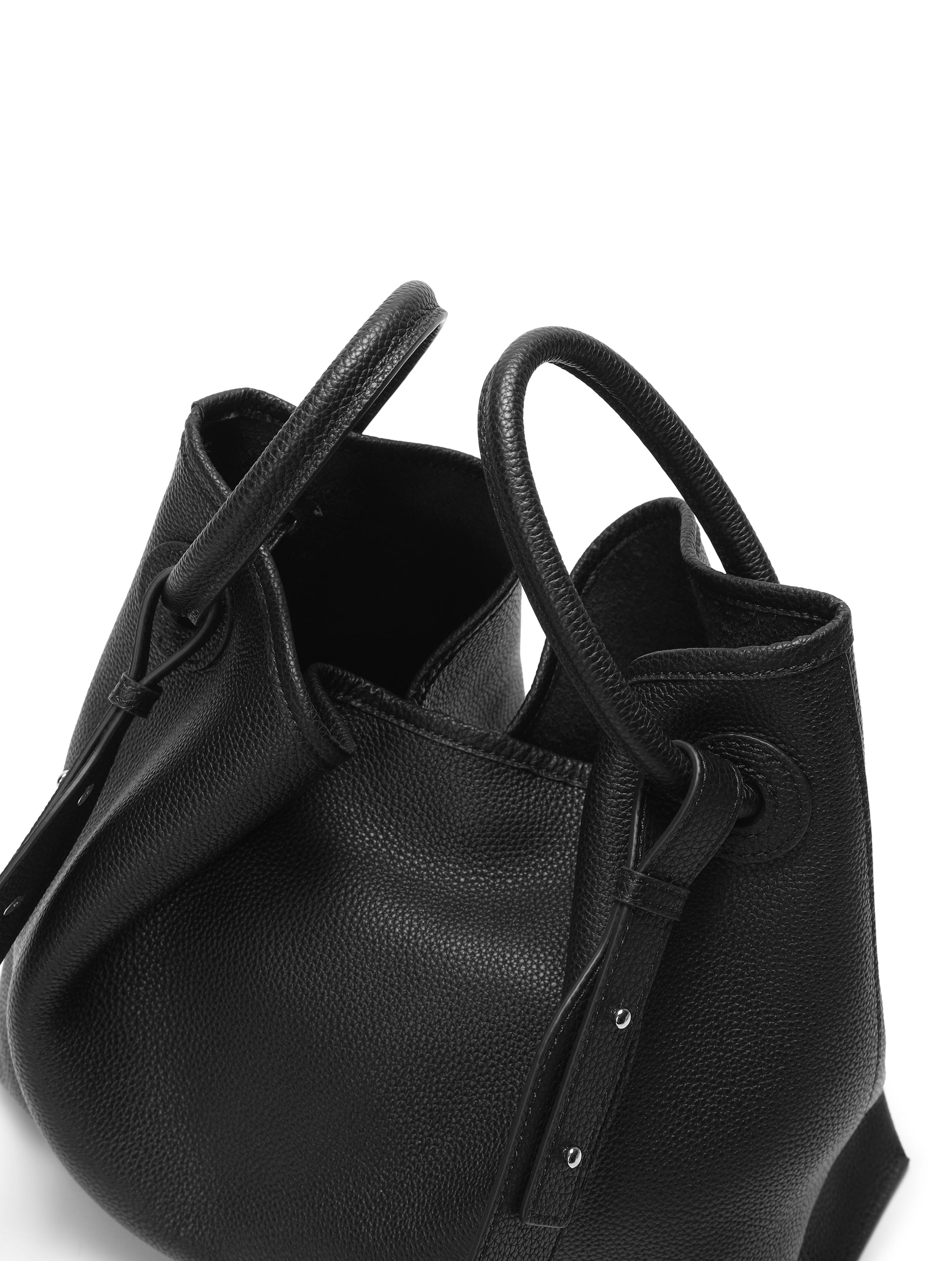 Black pebbled leather bucket bag with double handles and minimalist design