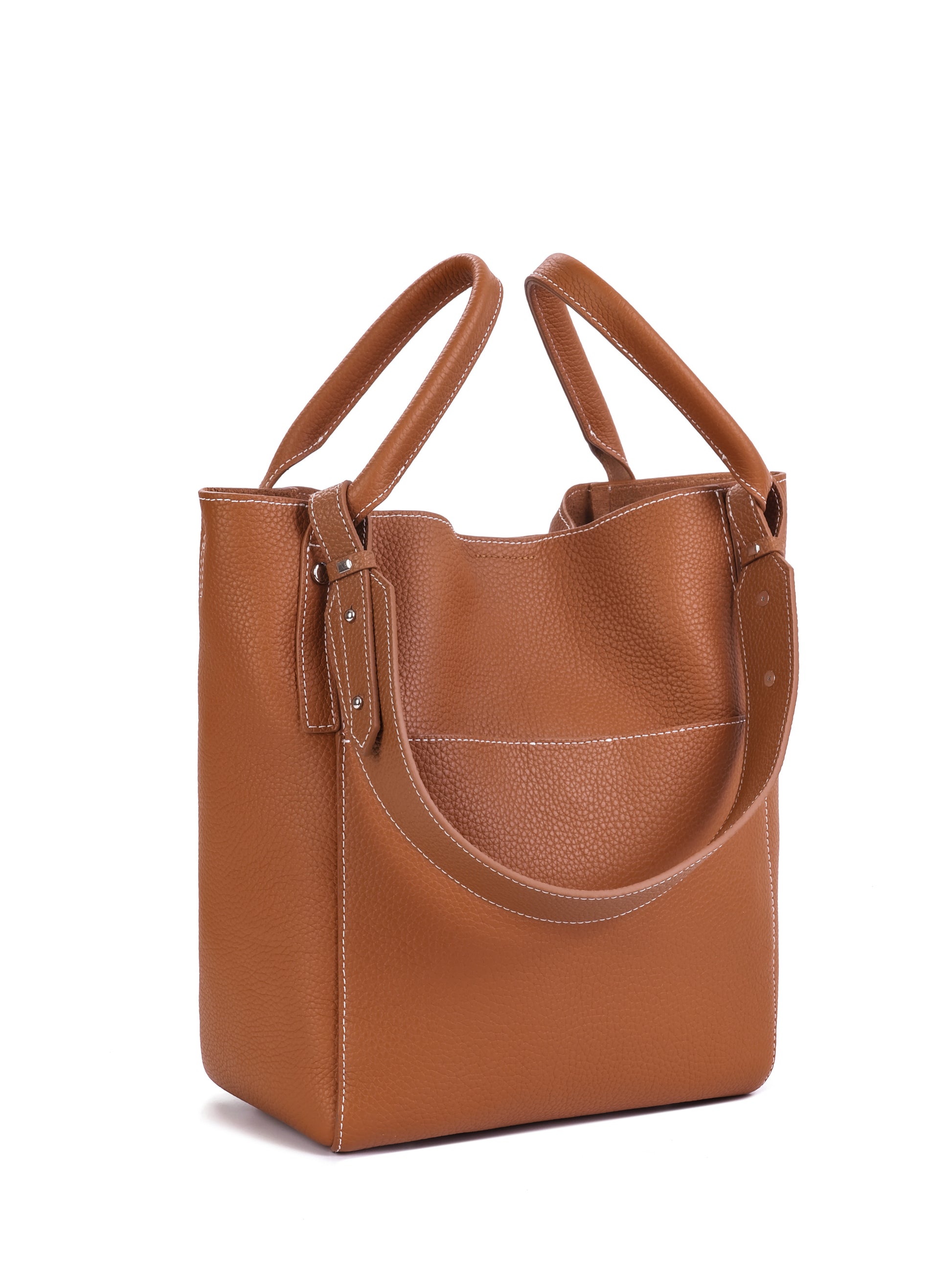 Brown leather tote handbag with double handles and visible stitching, isolated on white
